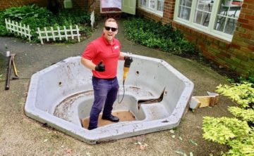 Image of hot tub being removed by Fire Dawgs