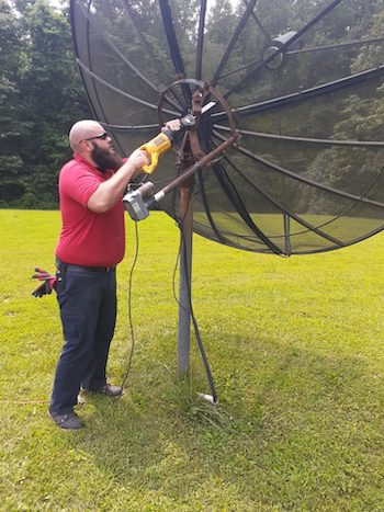 a picture of satellite dish removal in indianapolis